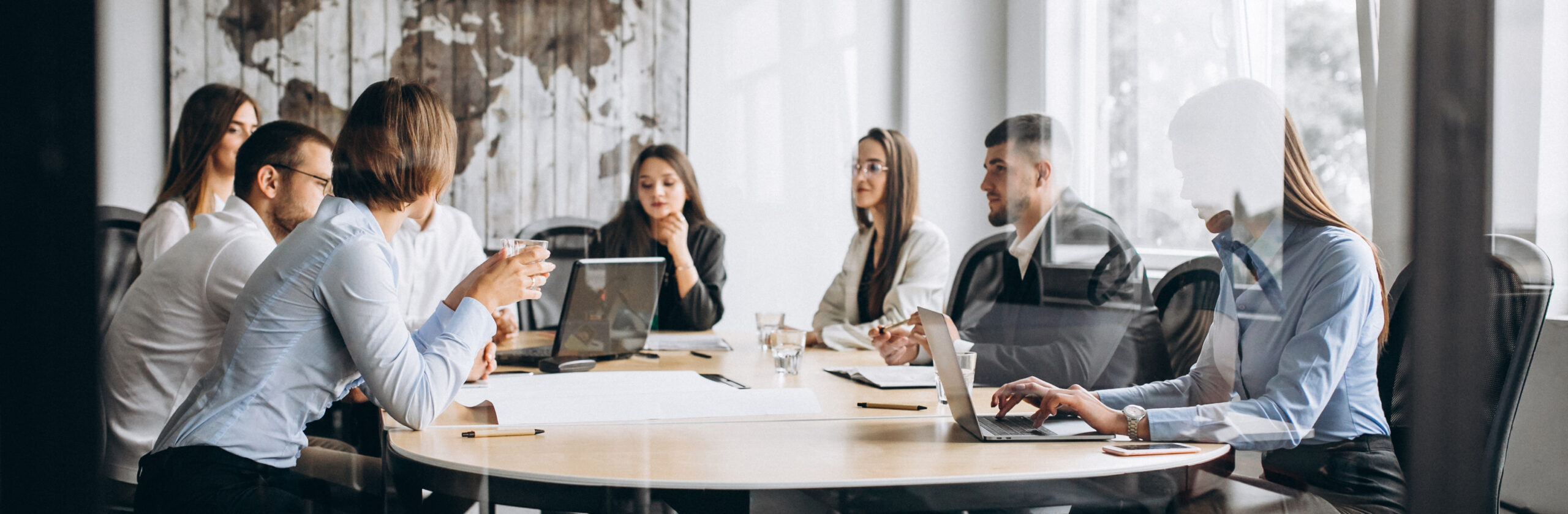 group-people-working-out-business-plan-office-resize-1-1536x503